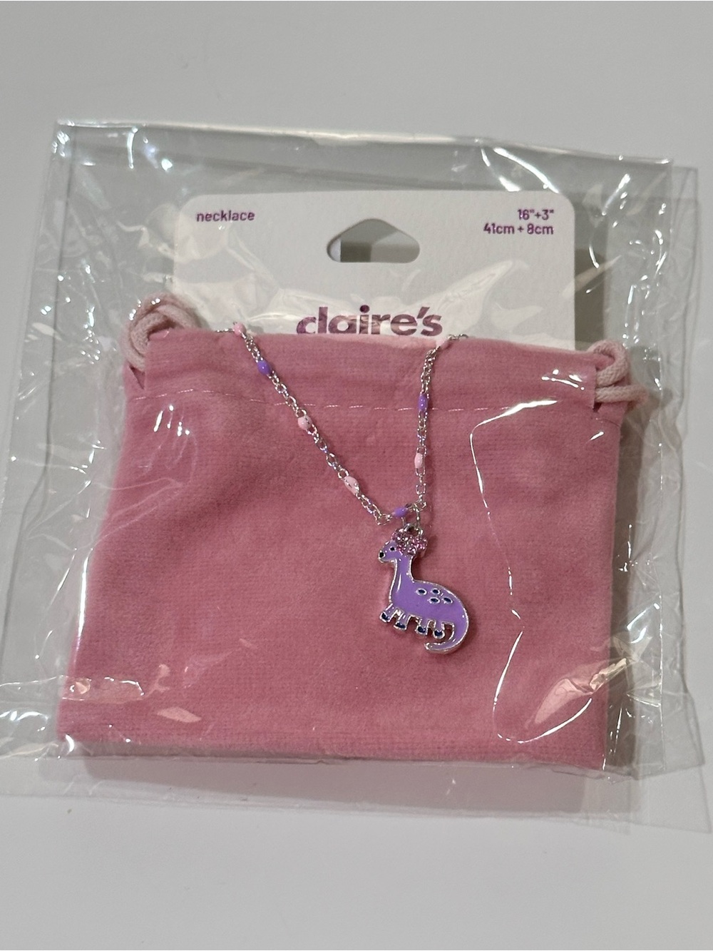 Claire's Purple Dinosaur Necklace with Pink Pouch
